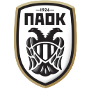 PAOK football club crest featuring a black double-headed eagle on a white shield with gold trim.
