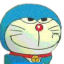 Doraemon the blue robotic cat with a smug, suspicious grin and narrow eyes.