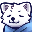 A white wolf with closed eyes wrapped in a blue blanket looking peaceful.