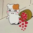 A small white creature with a sad expression tips over a wooden barrel, causing many red hearts to spill out onto the ground.