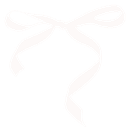 A white ribbon tied into a simple bow shape.