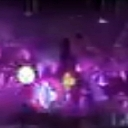 A glowing purple and white energy explosion radiating light.