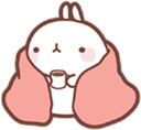 A cute white bunny wrapped in a pink blanket holding a small mug of hot cocoa.