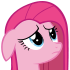 Pink pony looking down with a sad and disappointed expression.