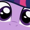 A close-up of a purple pony face with large, shiny, pleading eyes looking upward.