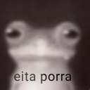 Frog with large, wide eyes stares blankly with the text eita porra written below it.