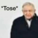 Man looking slightly confused with the text Tose written in white next to him.