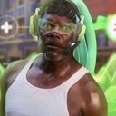 Samuel L. Jackson wearing a neon green headset and white tank top looking confused with digital green graphics in the backgr…