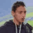 Young man looking directly at the camera with a confused and skeptical expression.
