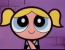 Bubbles from The Powerpuff Girls with a wide-eyed, innocent, and happy expression.