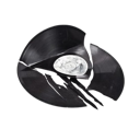 A broken black vinyl record with a silver center label.