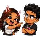 A girl with red devil horns laughing and pointing at a boy with glasses who looks annoyed and unimpressed.