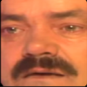 Man with a mustache wearing an intensely angry and disgusted expression, heavily distorted in a deep-fried meme style.