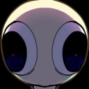 A pale creature with massive dark eyes staring forward with an intense, unblinking expression.
