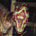 Creature with a distorted face and wide open mouth screaming.