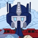 A blue and red robotic head with a flat, unimpressed expression staring directly forward.