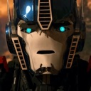 A robotic head with glowing blue eyes and a blank, stunned expression.