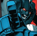 A blue robotic character with glowing red eyes points its finger forward with an aggressive expression.