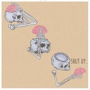A skeleton removes its brain from its skull and holds it while the text shut up appears next to it.
