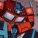 A red and blue robot with a slumped posture looking down in defeat.