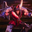 A red and white mechanical robot in an aggressive, forward-leaning combat stance.