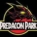 A dark, stylized creature with a glowing yellow eye looms over the text Predacon Park inside a circular logo.