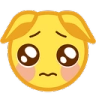 Yellow face with large, teary brown eyes and a trembling mouth expressing sadness.