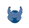 Stitch the blue alien hides his face with his hands before jumping up with open arms surrounded by pink hearts.