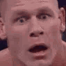 John Cena's face in four panels showing a progression from wide-eyed shock to a pained, grimacing expression of panic.