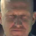 Todd Howard face distorted with a high-speed motion blur effect looking intensely at the viewer.