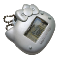 Hello Kitty shaped Tamagotchi digital pet toy in silver plastic.