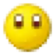 Yellow smiley face with large, dark, unblinking eyes staring forward.