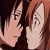 Two anime characters leaning in to share a romantic kiss.