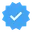 Blue badge with a white checkmark inside representing verified status.