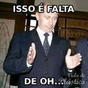 Vladimir Putin in a suit making a dismissive hand gesture with text overlaid on the image.