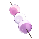 Dango on a skewer with two pink mochi balls and one white mochi ball in the center.