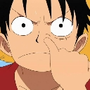 Monkey D. Luffy picking his nose with a blank, wide-eyed expression.