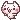 A small, white, blushing creature with a simple face running quickly to the right.