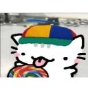 A white cartoon cat wearing a multicolored cap with its tongue out while eating a rainbow-colored object.