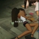 Bratz doll lying face-down on the floor in a pose of dramatic exhaustion.