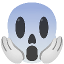 Ghost face with wide eyes and mouth open in a scream with hands pressed against its cheeks.