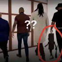 A group of men walking in a line with a small wooden figure standing between them, accompanied by question marks.