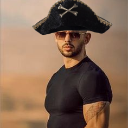 Andrew Tate wearing a black pirate hat with a skull and crossbones emblem.