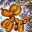 A yellow balloon dog shaped like a classic party animal.