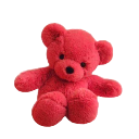 A fluffy red teddy bear sitting and looking forward.