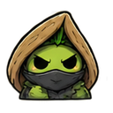 A small green creature wearing a brown hood and black face mask looking intensely at the viewer.