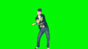 A man in a black jacket and jeans performs a series of dance moves against a bright green background.