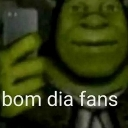 Green ogre taking a selfie with a phone and the text bom dia fans at the bottom.