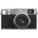 A silver and black vintage rangefinder camera facing forward.