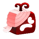 A red cube topped with layered pink ribbons or frosting.
